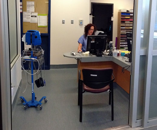 Faster triage: Diana Hawkes, RN, in the UCC’s new registration area where patients will be triaged in five to eight minutes.