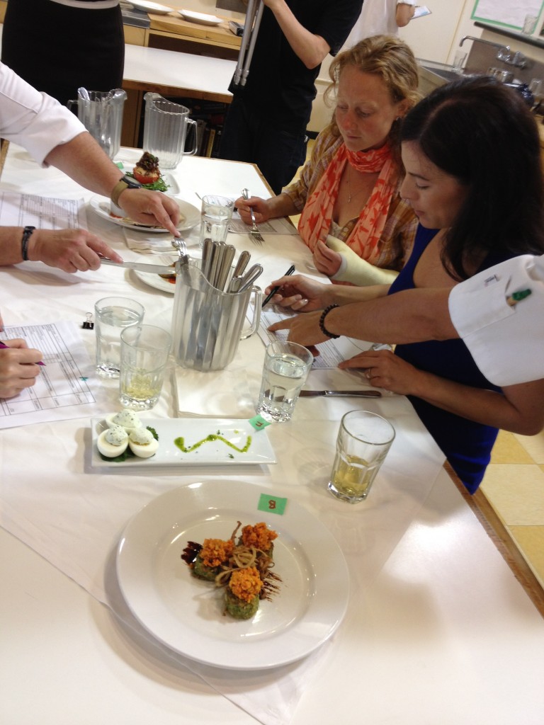 Farmer Ilana Labow and dietitian Melissa LeBlanc take part in judging the appetizers.  