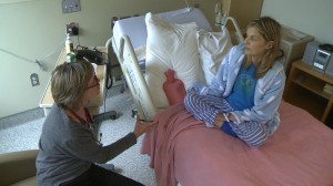 Dr. Wendy Yeomans consults with patient Catherine about her ongoing care in the Palliative Care unit at VGH. 